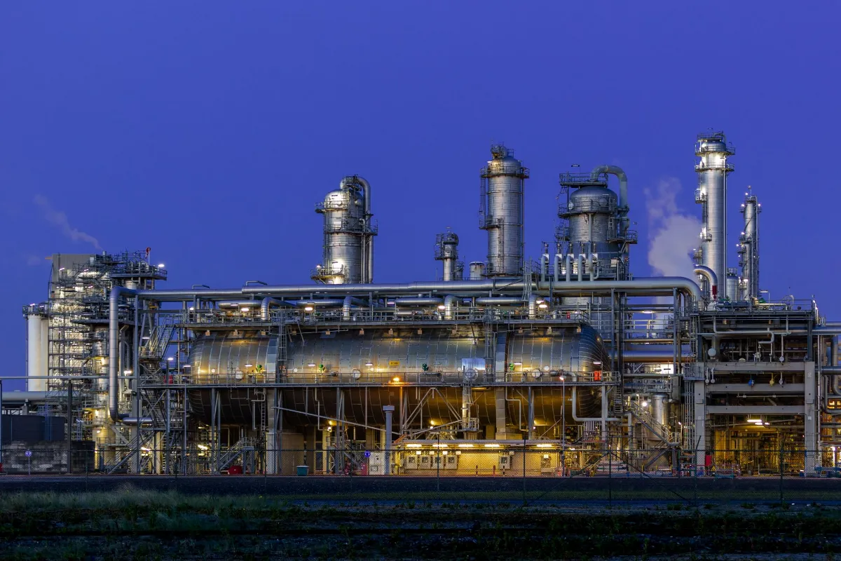 Industrial plant lit at dusk